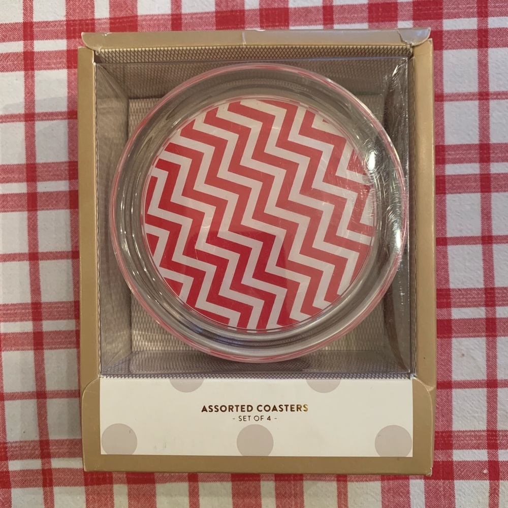 Set of 4 red and white glass coasters. New in box